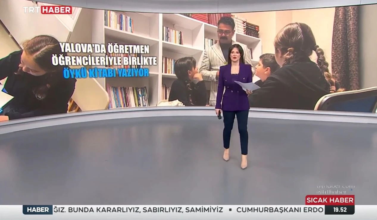 Öğretmen ve öğrenciler kitap yazıyor